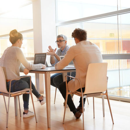 bigstock-Teacher-meeting-around-table-w-228872404